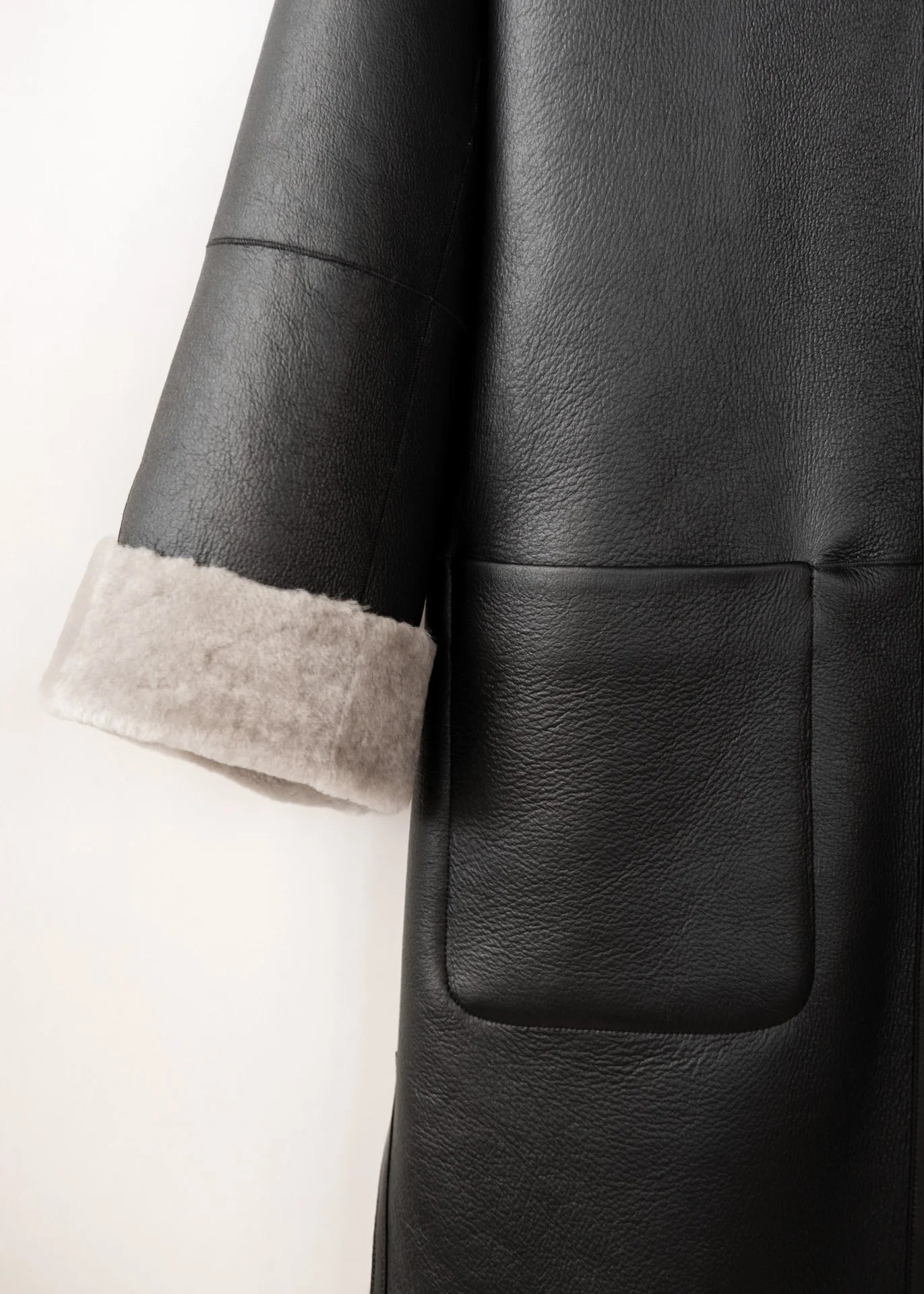 Manteau en peau lainée