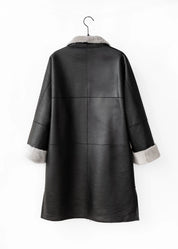 Manteau en peau lainée