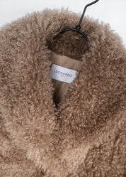 Manteau en fausse fourrure bouclée
