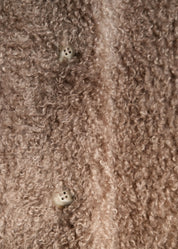Manteau en fausse fourrure bouclée