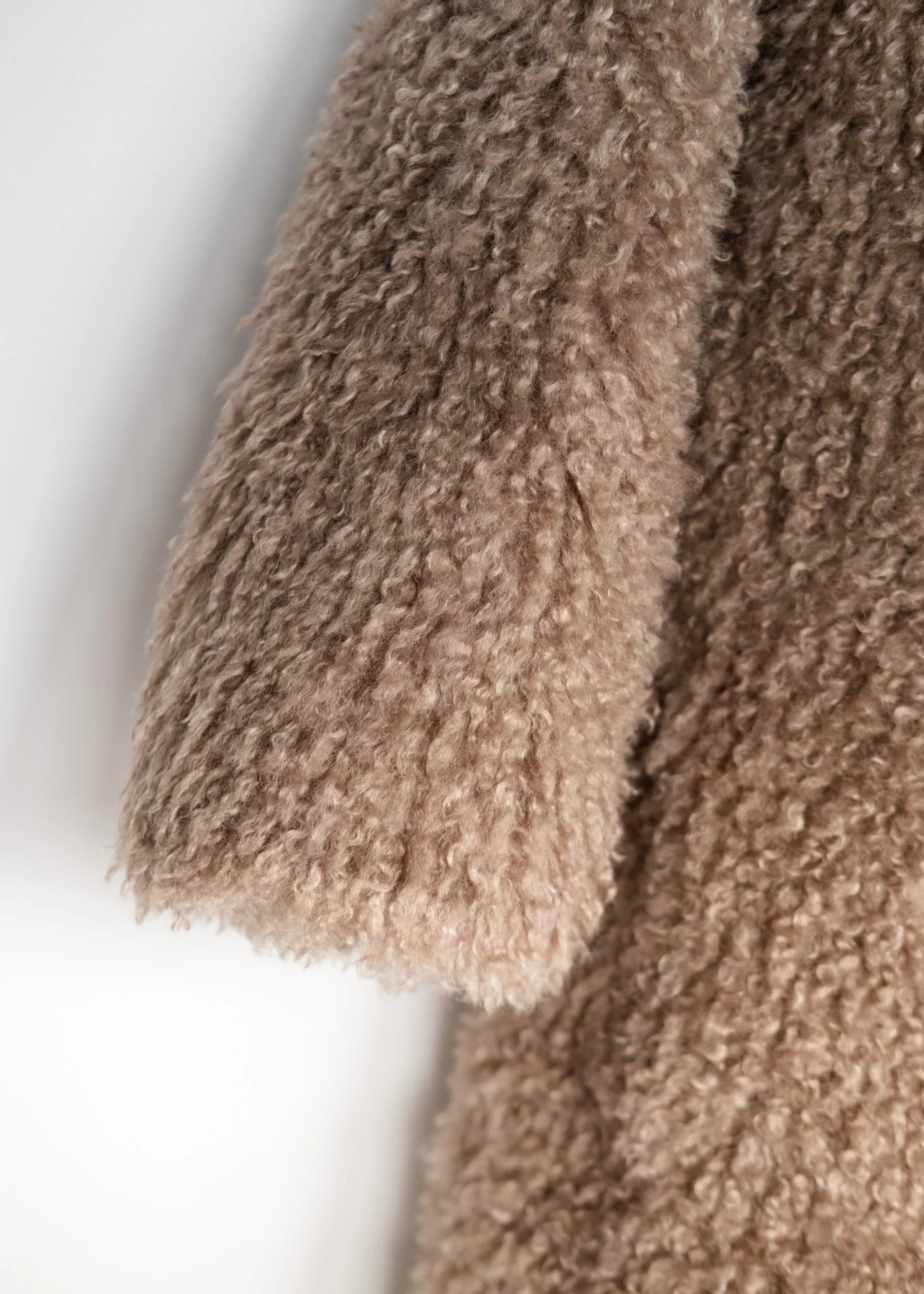 Manteau en fausse fourrure bouclée