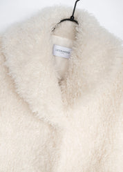 Lockiger Faux Fur Mantel