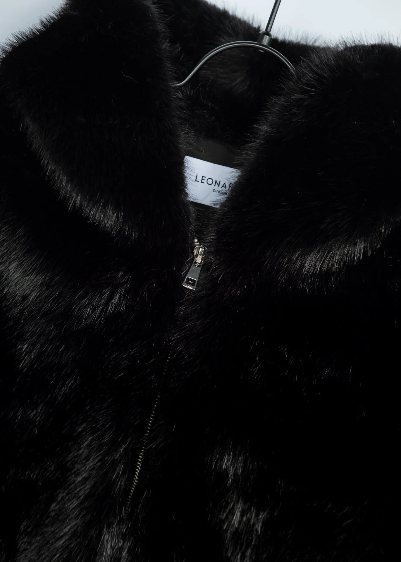 Faux Fur Jacke mit Kapuze